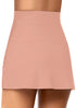 Back view of model wearing blush tulip hem high waist ruched swim skirt