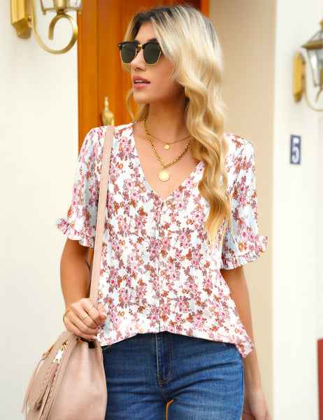 Front view of model wearing light pink ruffle trim short sleeves printed v-neck button-down top