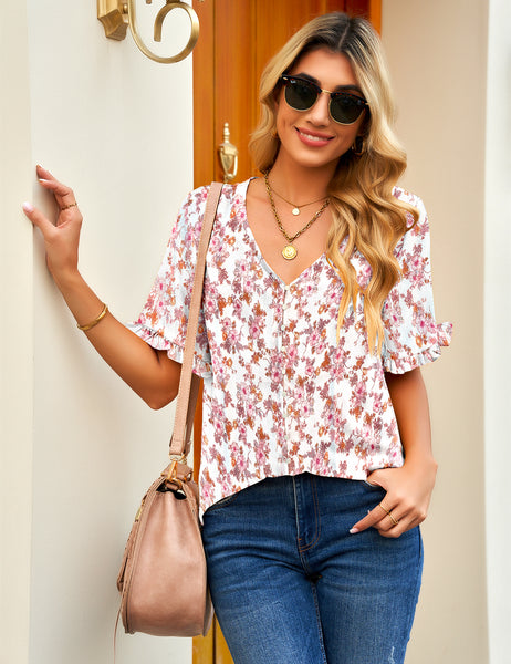 Front view of model wearing light pink ruffle trim short sleeves printed v-neck button-down top