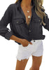Posing model wearing black long sleeves button-down denim shirt