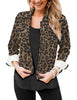 Front view of model wearing leopard print button down women's denim jacket