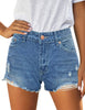 Front view of model wearing light blue ripped mid-waist raw hem denim shorts