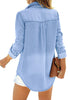 Back view of model wearing light blue long sleeves button-down denim shirt