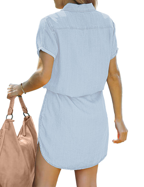 Back view of model wearing sky blue elastic waist curved hem button down denim shirt dress