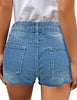 Back view of model wearing light blue ripped mid-waist raw hem denim shorts
