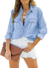 Front view shot of model wearing light blue long sleeves button-down denim shirt