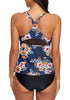 Back view of model wearing navy blue racerback floral tankini set