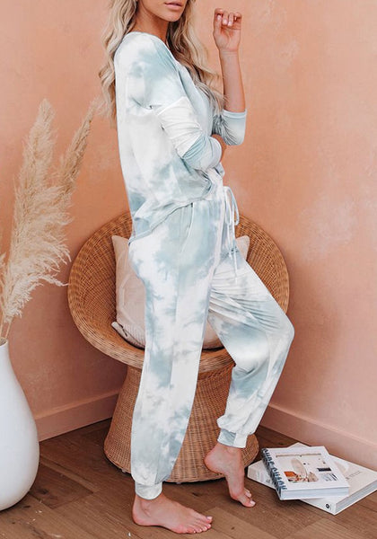 Side view of model wearing blue tie-dye drawstring-waist jogger pajama set