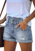 Angled shot of model wearing blue high-waist double button cuffed hem ripped denim shorts