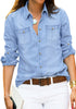 Front view of model wearing light blue long sleeves button-down denim shirt