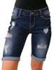 Front view of model wearing dark blue women mid-waist frayed bermuda denim shorts