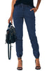 Front view of model wearing deep elastic-waist welt pockets denim jogger pants