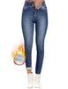Model wearing light blue triple button fleece-lined skinny denim jeans