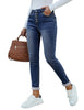 Side view of model wearing dark blue fleece-lined button-down denim skinny jeans