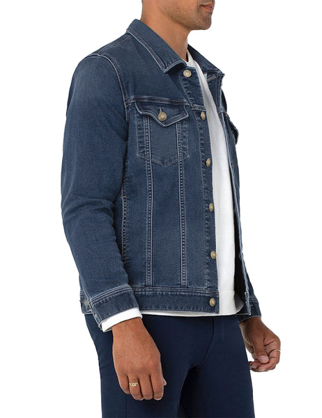Side view of model wearing dark blue men's basic button down denim jacket