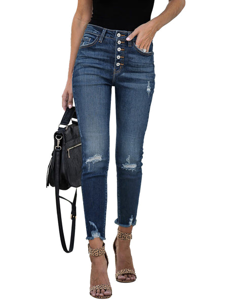 Model poses wearing blue high-waist button-up frayed raw hem ripped cropped jeans