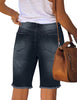 Back view of model wearing frayed hem fitted bermuda shorts - dark blue 