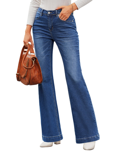 Model poses wearing dark blue mid-waist stretchable straight leg denim jeans