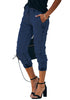 Side view of model wearing deep elastic-waist welt pockets denim jogger pants