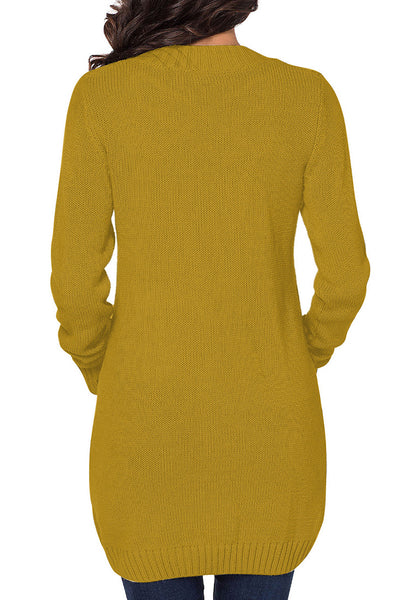 Back view of model wearing mustard front pockets button-up cable knit cardigan