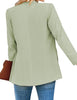 Back view of model wearing mint green open-front side pockets blazer.