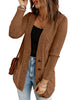 Angled shot of model wearing brown front pockets button-up cable knit cardigan