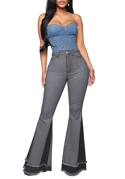 Full front view of model wearing grey stretchy frayed hem flared denim jeans