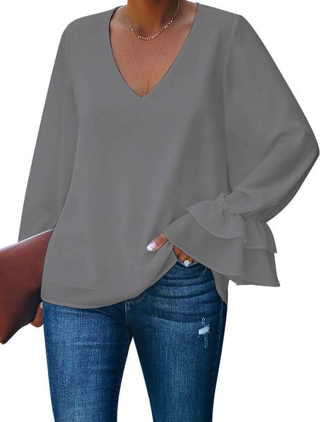 Front view of model wearing grey ruffle cuff long sleeves V-neck blouse