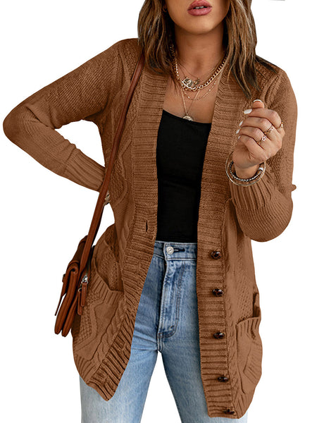 Posing model wearing brown front pockets button-up cable knit cardigan