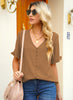Front view of model wearing light brown ruffle trim short sleeves V-neck button-down top