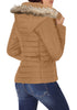 Back view of model wearing camel faux fur hooded zip up quilted jacket 