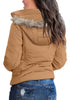 Back view of model wearing camel faux fur hooded zip up quilted jacket 