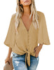 Front view of model wearing tan v-neckline button-up tie-front top