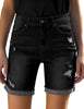 Model wearing black rolled hem distressed biker shorts