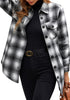 Front view of model wearing black plaid long sleeves button down jacket