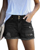 Front view of model wearing black double button raw hem ripped jean shorts