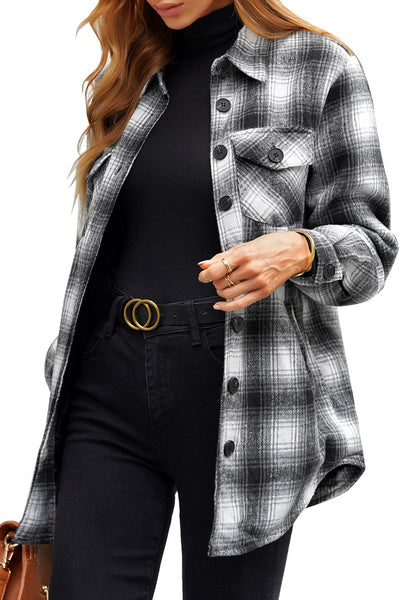Angled shot of model wearing black plaid long sleeves button down jacket