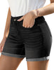 Side view of model wearing black rolled hem slim fit denim shorts