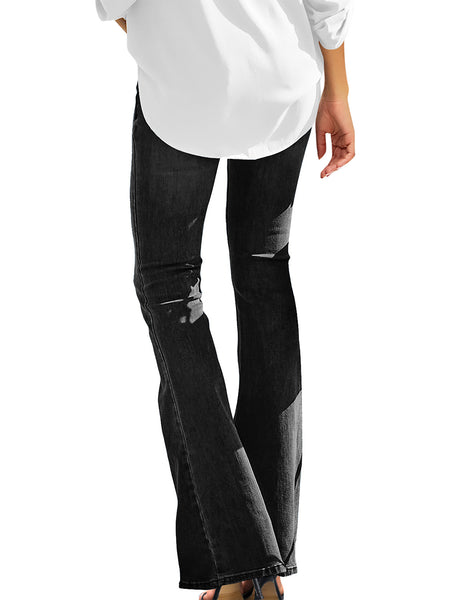 Back view of model wearing black mid-waist wide leg flared denim jeans