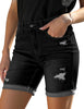 Angled view of model wearing black rolled hem distressed biker shorts