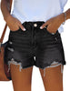 Front view of model wearing black high waist ruched hem distressed denim shorts