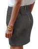 Side view of model wearing black tulip ruched denim mini skirt