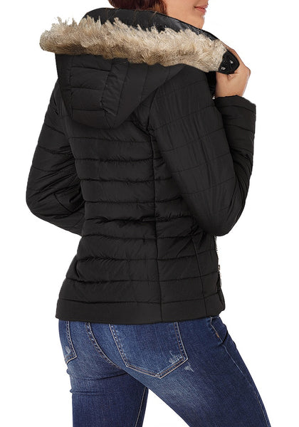Back view of model wearing black faux fur hooded zip up quilted jacket 