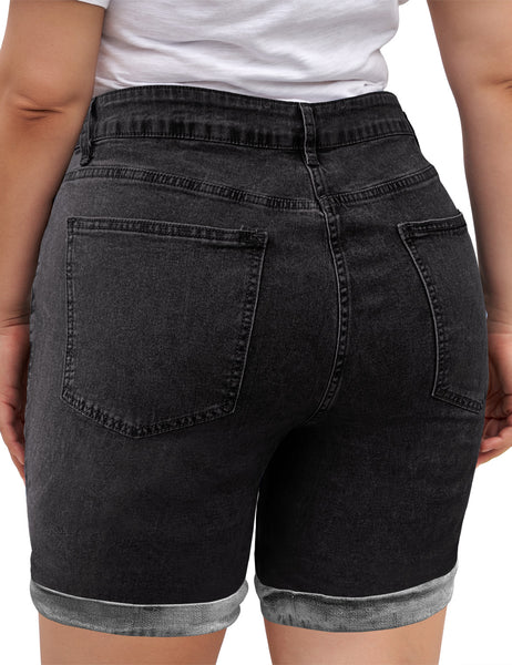 Back view of model wearing black high-waist cuffed hem distressed denim biker shorts