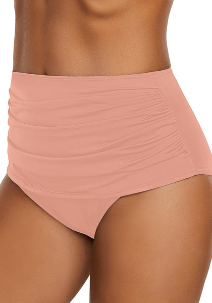 Side view of model wearing blush pink high waist ruched swim bottom