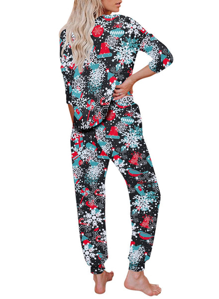Back view of model wearing black christmas snowflake drawstring-waist jogger pajama set
