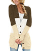 Front view of model wearing brown colorblock front pockets button-up cable knit cardigan