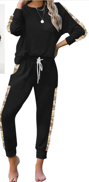 Front view of model wearing black long sleeves drawstring jogger loungewear set