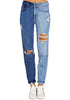 Front view of model wearing azure blue color block cuffed ripped denim boyfriend jeans