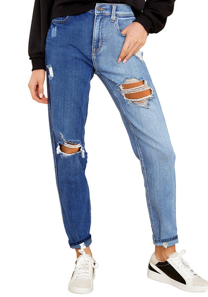Model poses wearing azure blue color block cuffed ripped denim boyfriend jeans